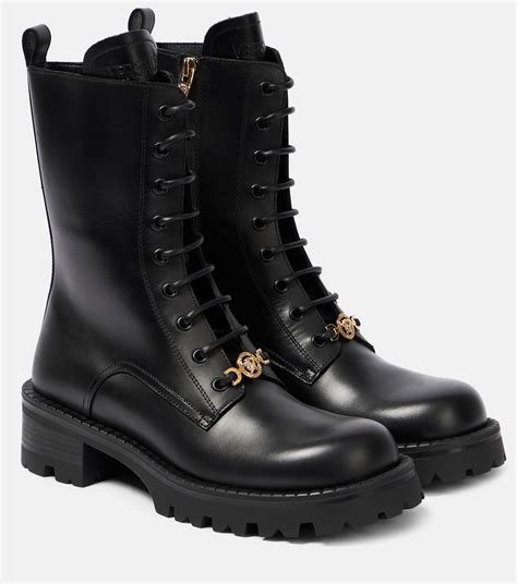 versace snakeskin boots|Versace lace up boots.